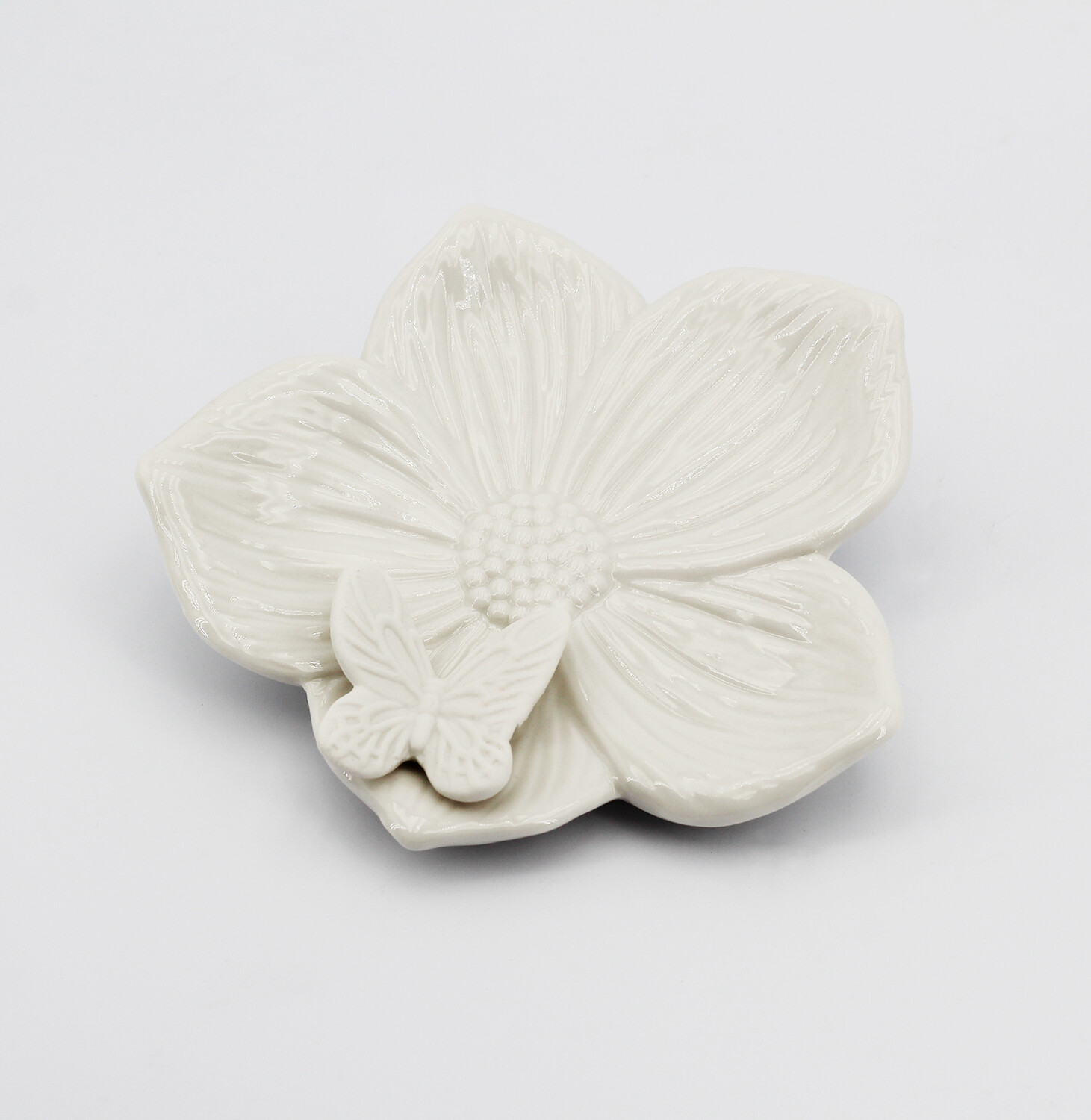 Svuota-tasche fiore con farfalla con astuccio rigido Pz. 1